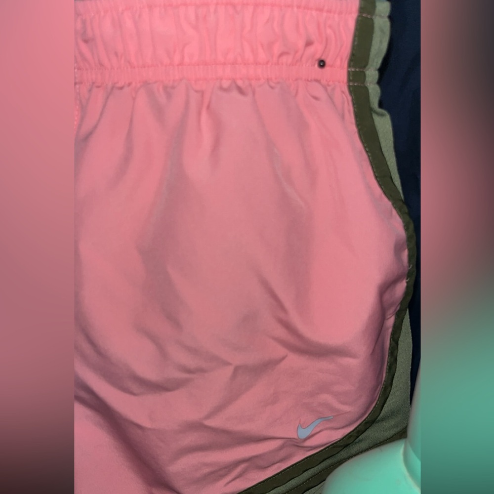 Pink and Green Nike Dri-Fit shorts.